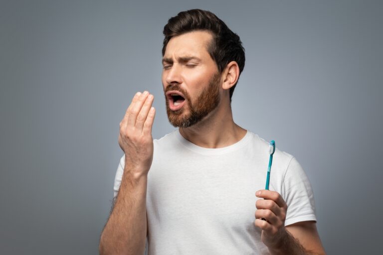 Why Does My Breath Smell Even After I Brush My Teeth? (Reasons & Remedies)