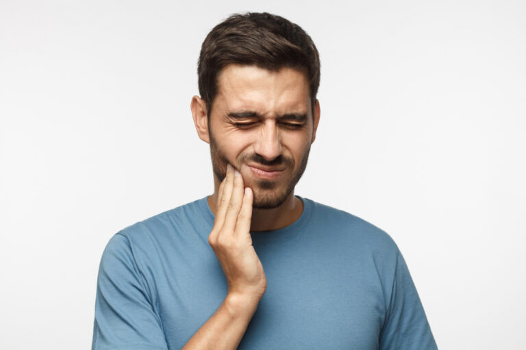 Can Throbbing Tooth Pain Go Away? (Causes & Treatments)