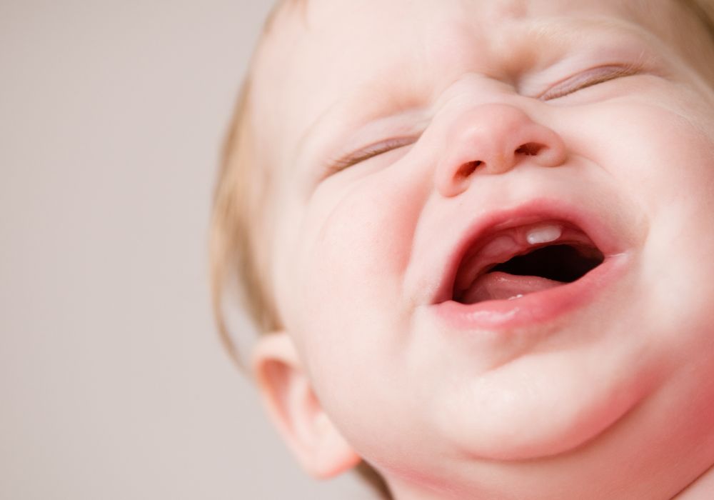 Home treatment for mild fever and teething discomfort