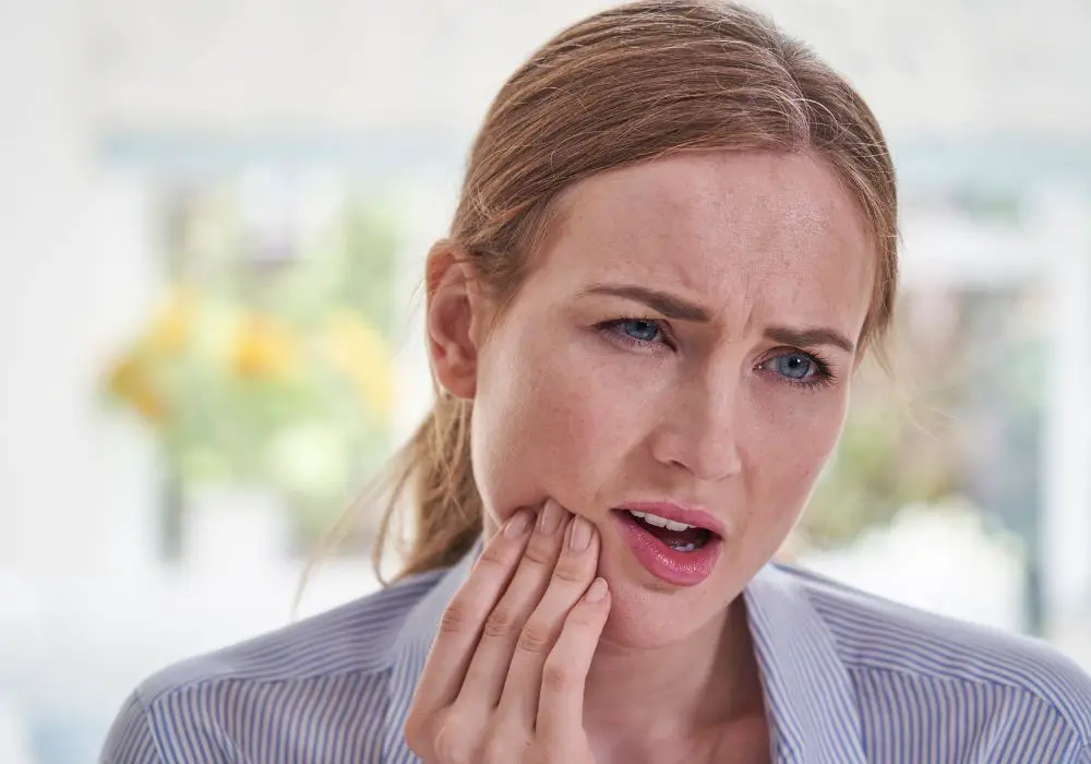 What causes bone loss in the jaw?