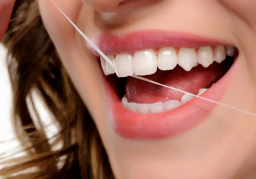 What causes gaps between teeth?