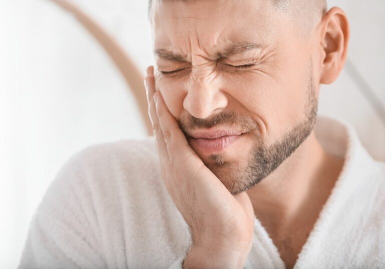 Why Does My Tooth Hurt To Touch On One Side? (Causes & Treatments)