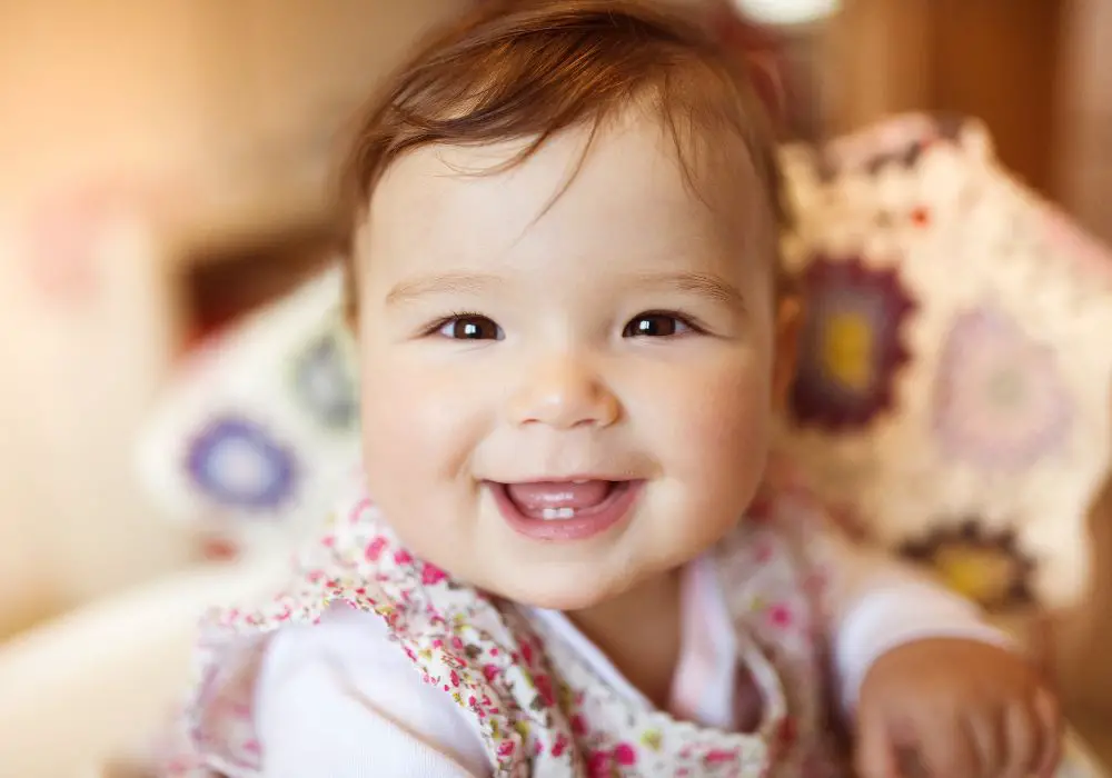 What is the best way to clean emerging baby teeth