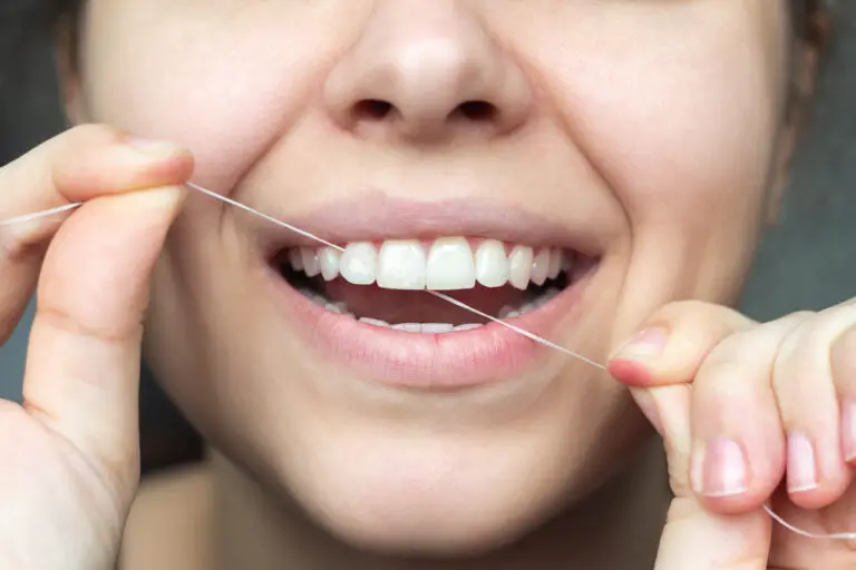 Why Do My Teeth Feel Gritty When I Floss? (Reasons & Tips)