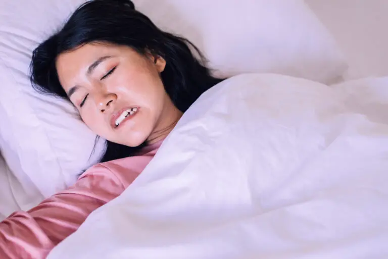 Why Do I Grind My Teeth During Sleep? (Signs & Treatment)