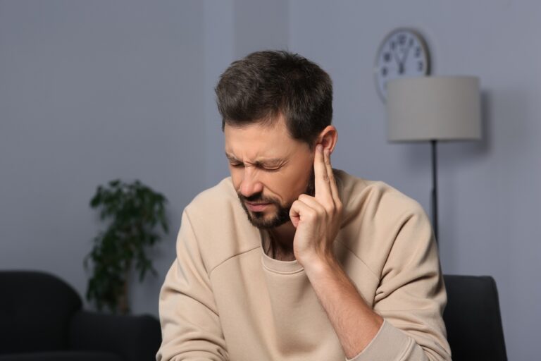 Why do I have nerve pain in my ear after tooth extraction?