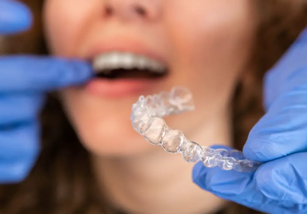 Why do teeth continue to feel loose after Invisalign treatment?