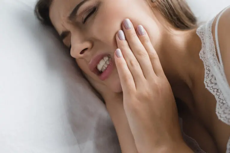 Why Do Teeth Hurt More When Lying Down? (Causes & Treatments)