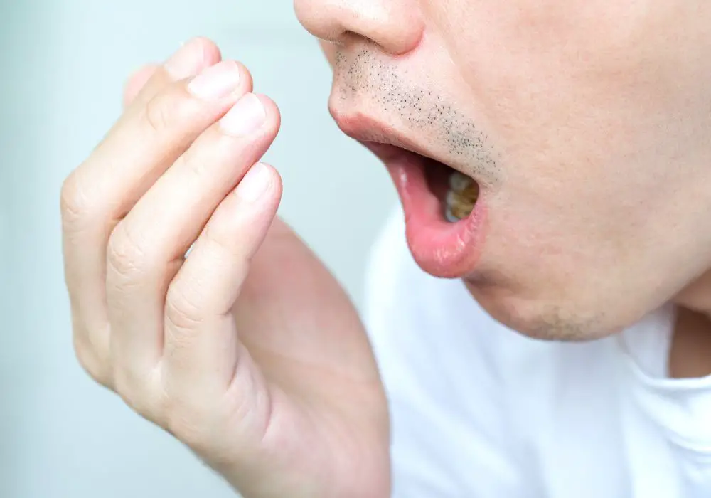 Why Does My Back Tooth Smell Bad? (Causes & Dental Treatments)