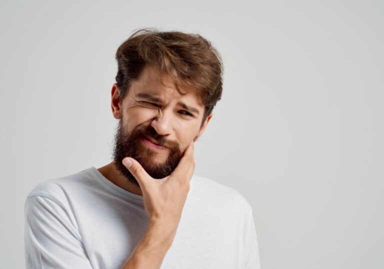 Why does my whole jaw hurt from wisdom teeth? (Causes & Solutions)