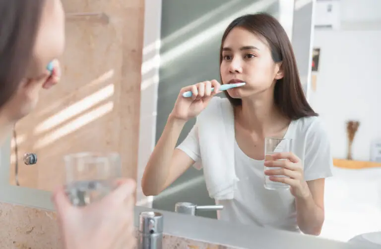 Why should you wait 30 minutes to drink after brushing teeth?