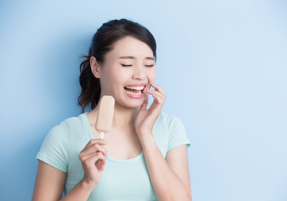 Sensitive Teeth to Cold Causes Beyond Cavities