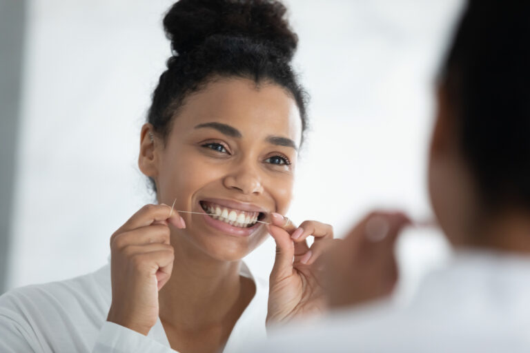 Is Touching Your Gums While Flossing Good or Bad?